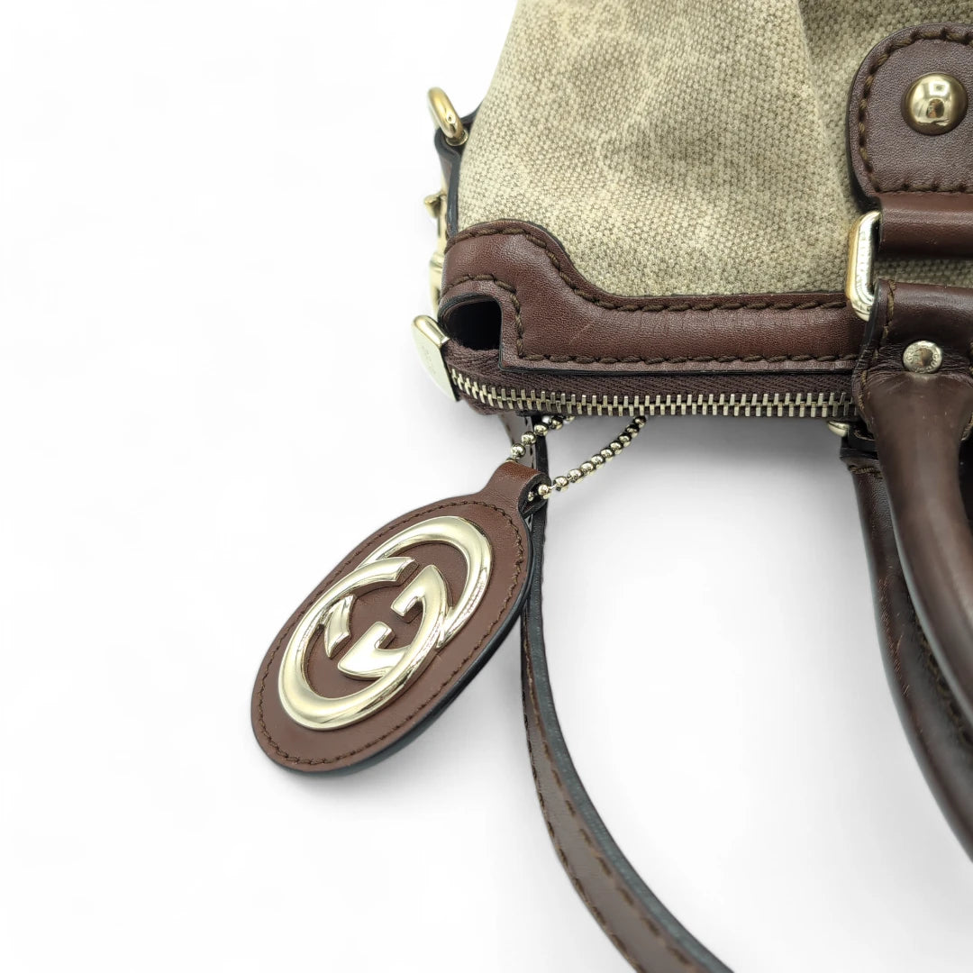 Gucci Handtasche Sukey Lederdetails braun mit Umhängegurt monogram beige