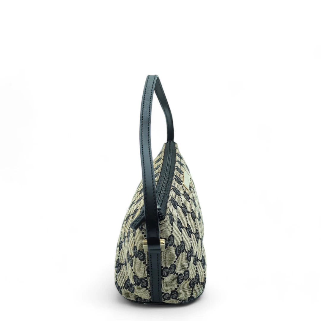 Gucci Handtasche Baguette mit schwarzen Lederdetails monogram beige