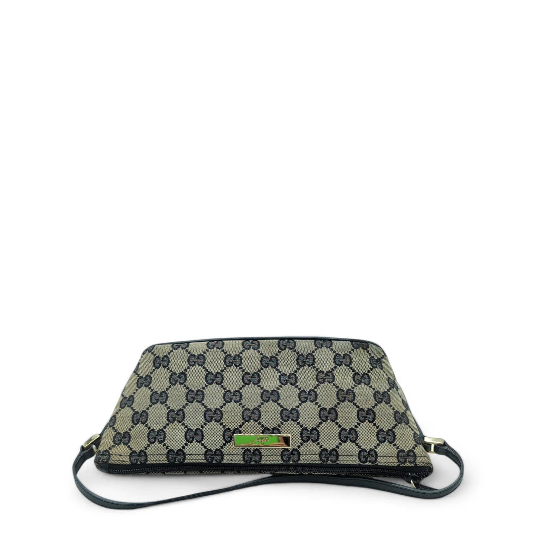 Gucci Handtasche Baguette mit schwarzen Lederdetails monogram beige