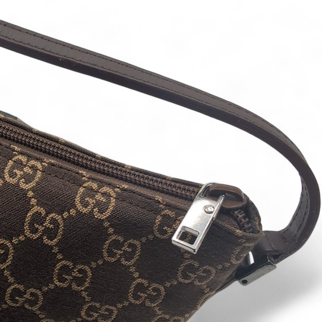 Gucci Handtasche Baguette monogram dunkelbraun