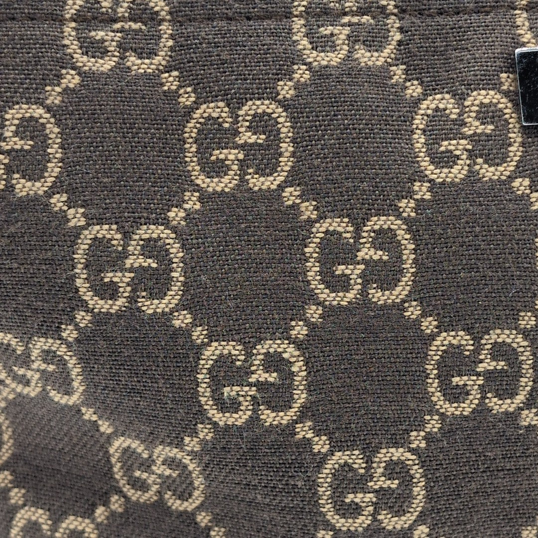 Gucci Handtasche Baguette monogram dunkelbraun