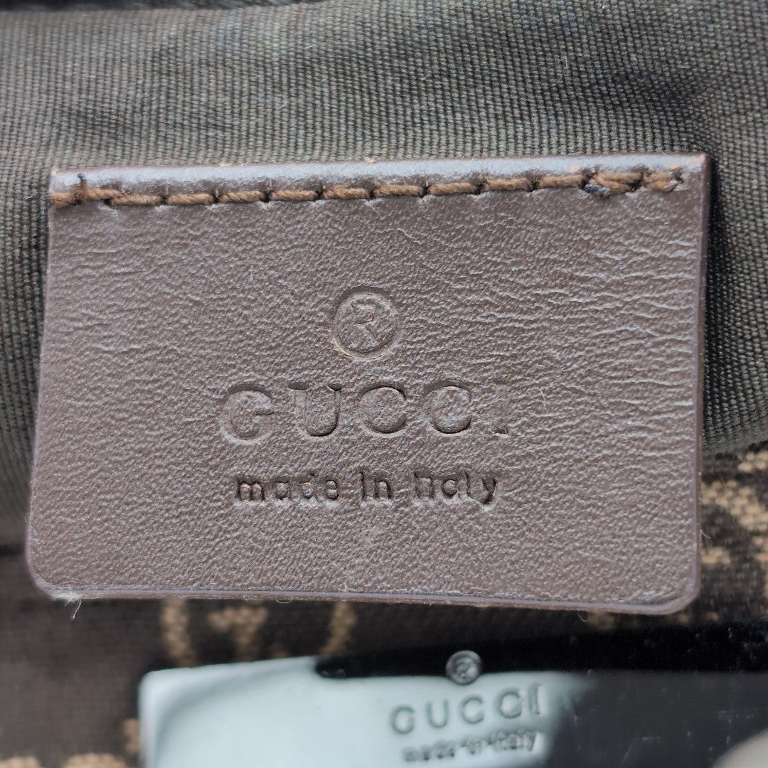 Gucci Handtasche Baguette monogram dunkelbraun