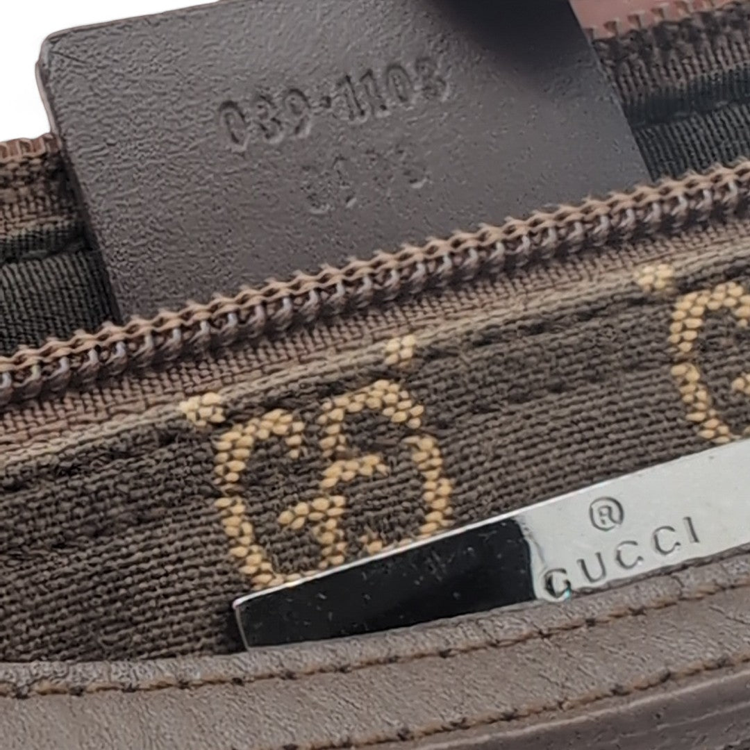 Gucci Handtasche Baguette monogram dunkelbraun