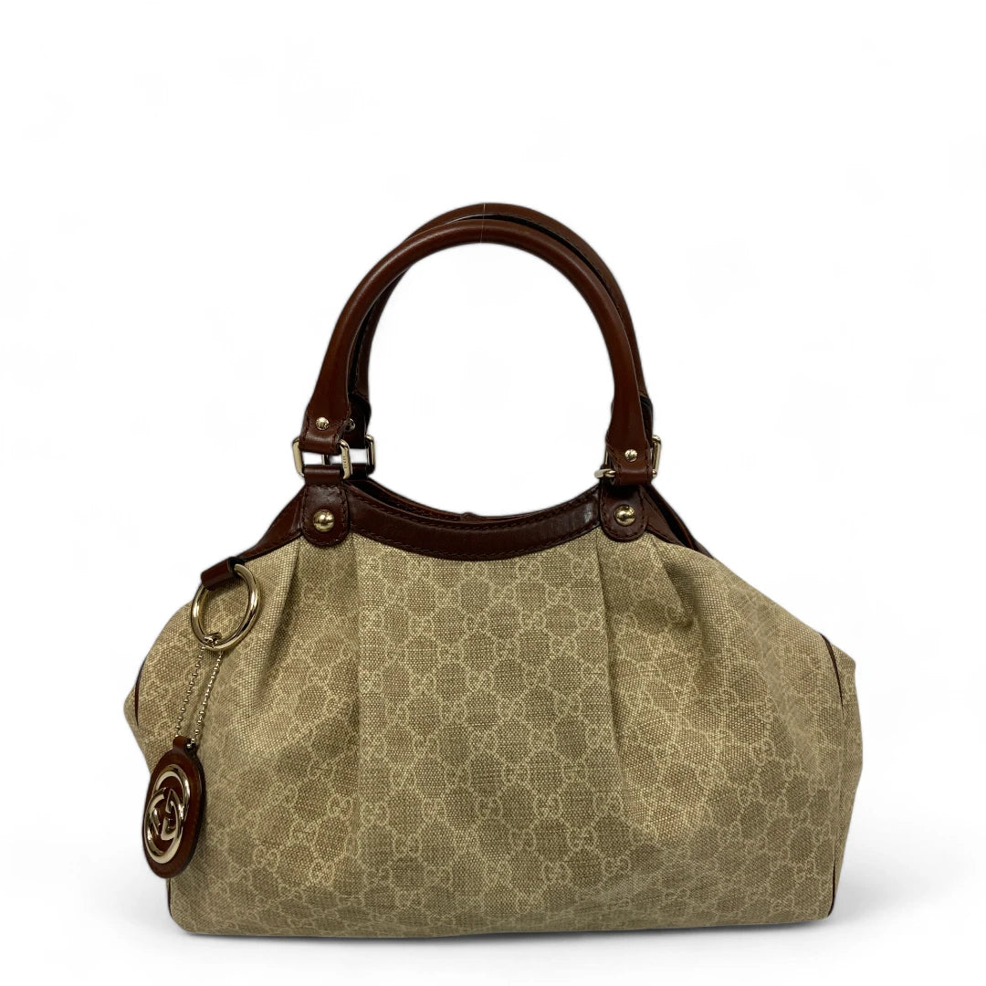 Gucci Handtasche Sukey mit braunen Lederdetails monogram beige