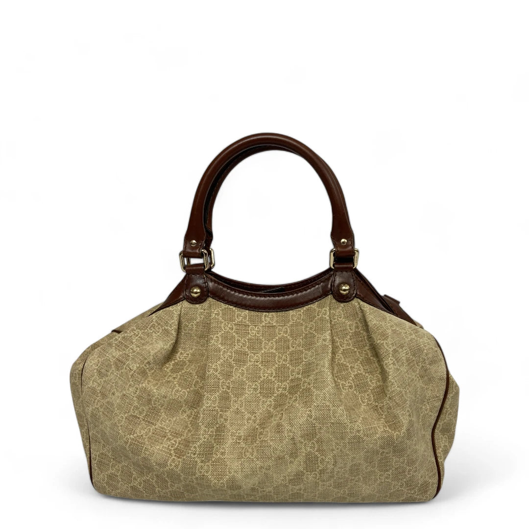 Gucci Handtasche Sukey mit braunen Lederdetails monogram beige