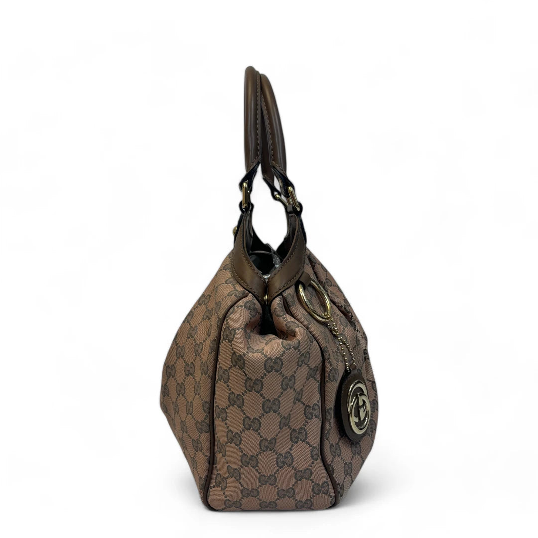 Gucci Handtasche Sukey mit braunen Lederdetails monogram braun