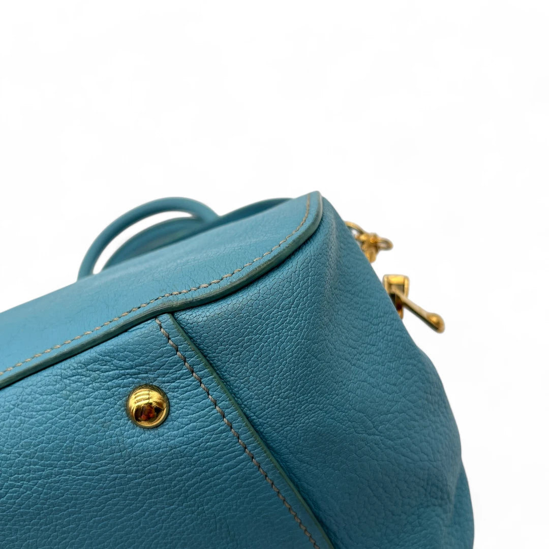 Miu Miu Madras handbag with shoulder strap in light blue leather