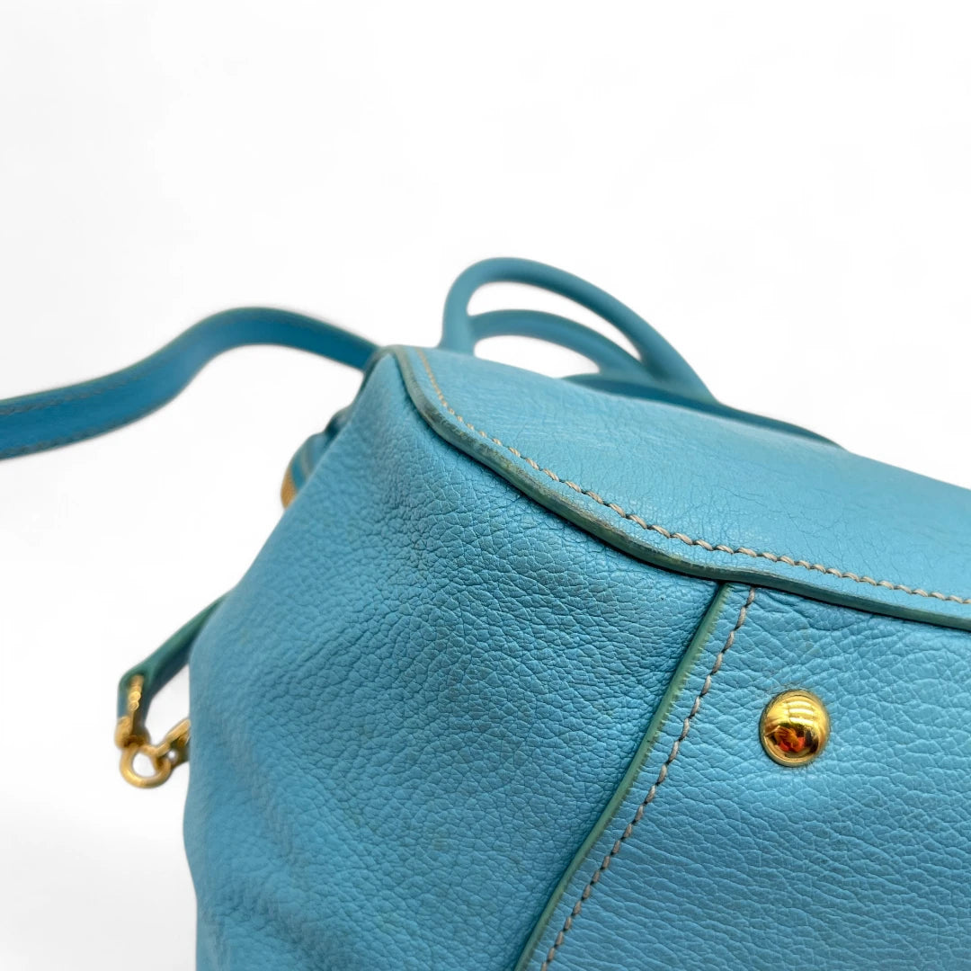 Miu Miu Madras handbag with shoulder strap in light blue leather