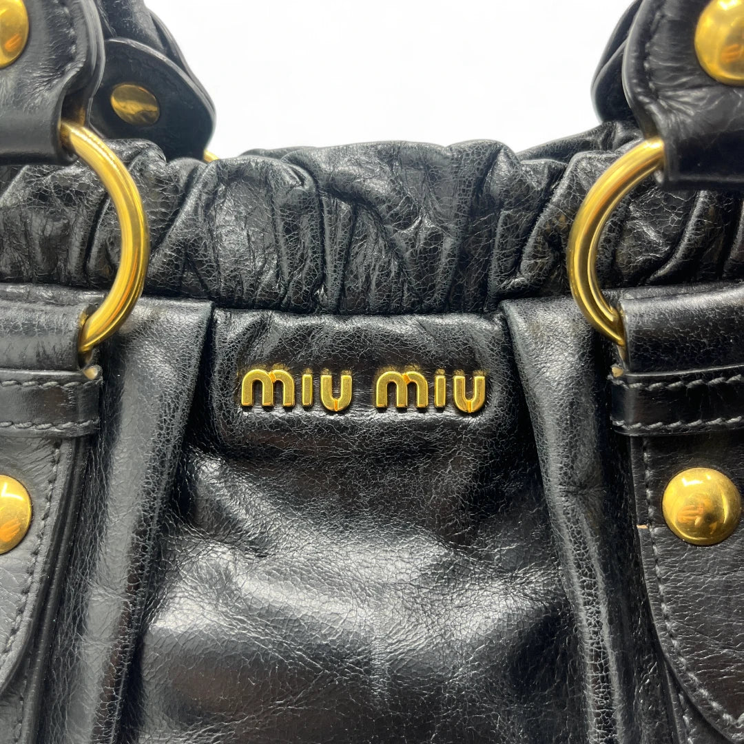 Miu Miu handbag Vitello Lux with shoulder strap made of black leather