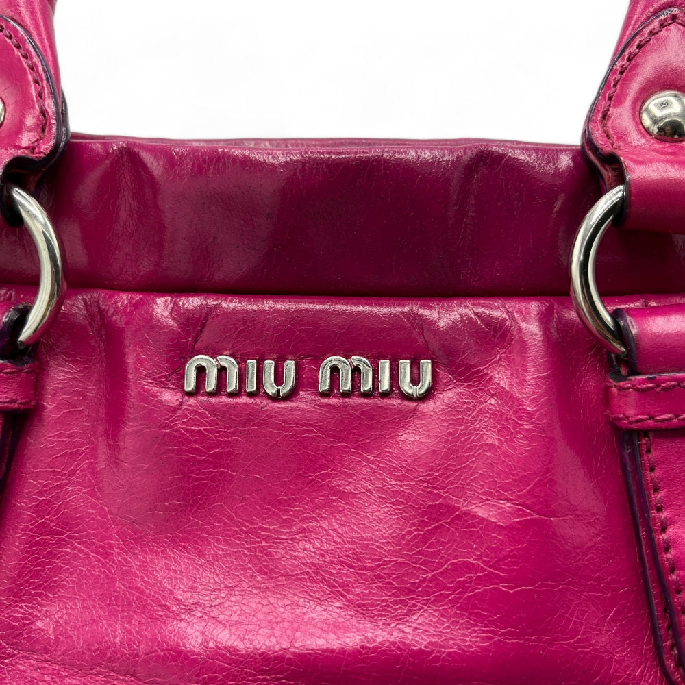 Miu Miu Handtasche Vitello klein mit Schleifen aus Leder mit silber Hardware pink