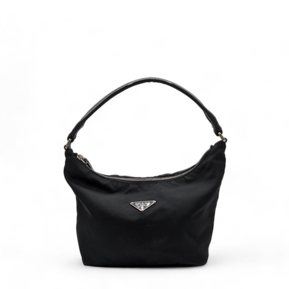 Prada handbag made of nylon with blue leather handles