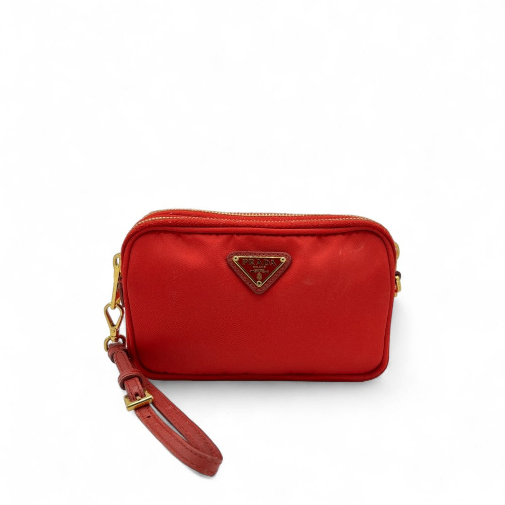 Prada small pochette made of nylon with gold details pink